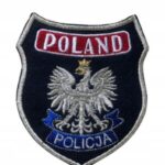 Emblemat policyjny z napisem POLAND